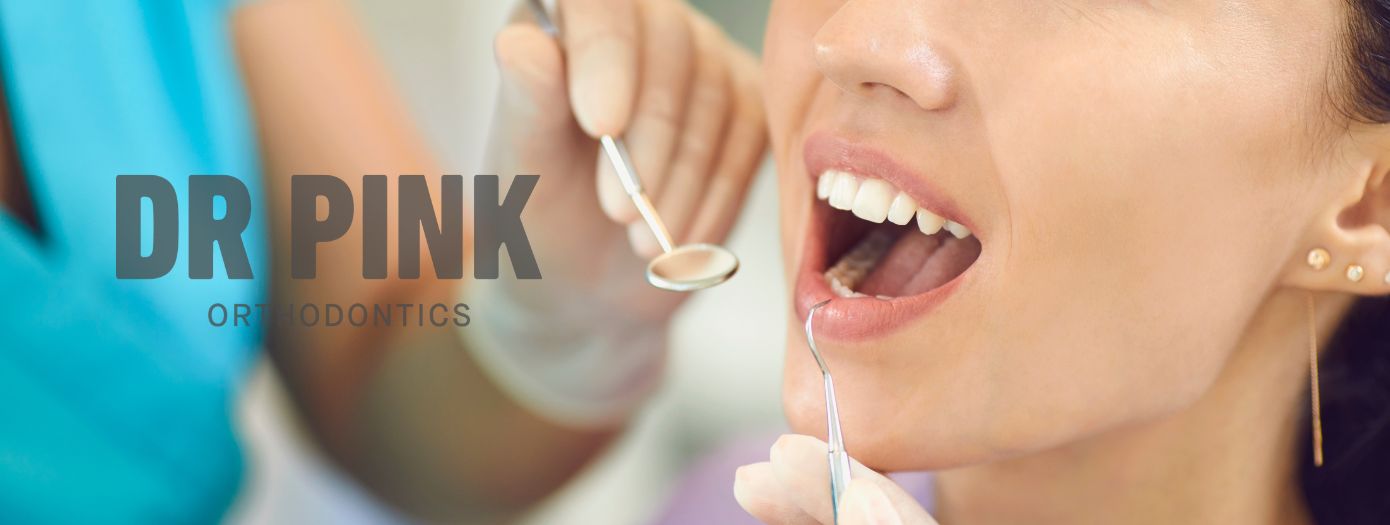 orthodontist-in-monroe Orthodontist in Monroe working with patient